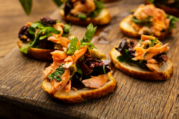 Roasted Trout, Caper and Olive Crostini